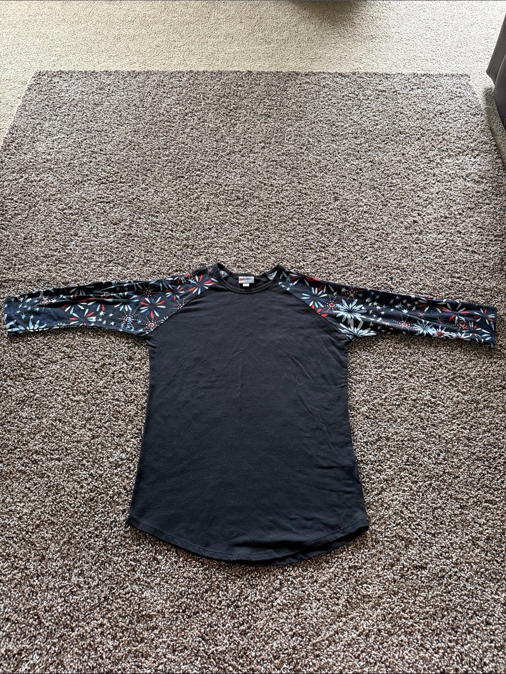 LuLaRoe Black Raglan 3/4 Sleeve Tee with “fireworks” pattern on sleeves